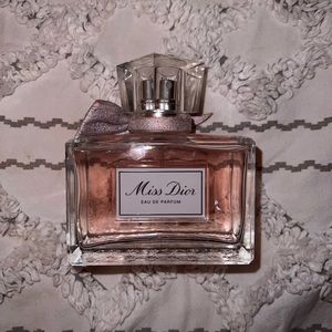 Miss Dior Eau De Parfum 3.4 oz; hardly used.